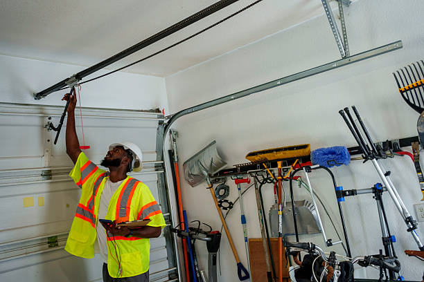 Professional Garage Door Panel Replacement technician working in Belcourt, ND